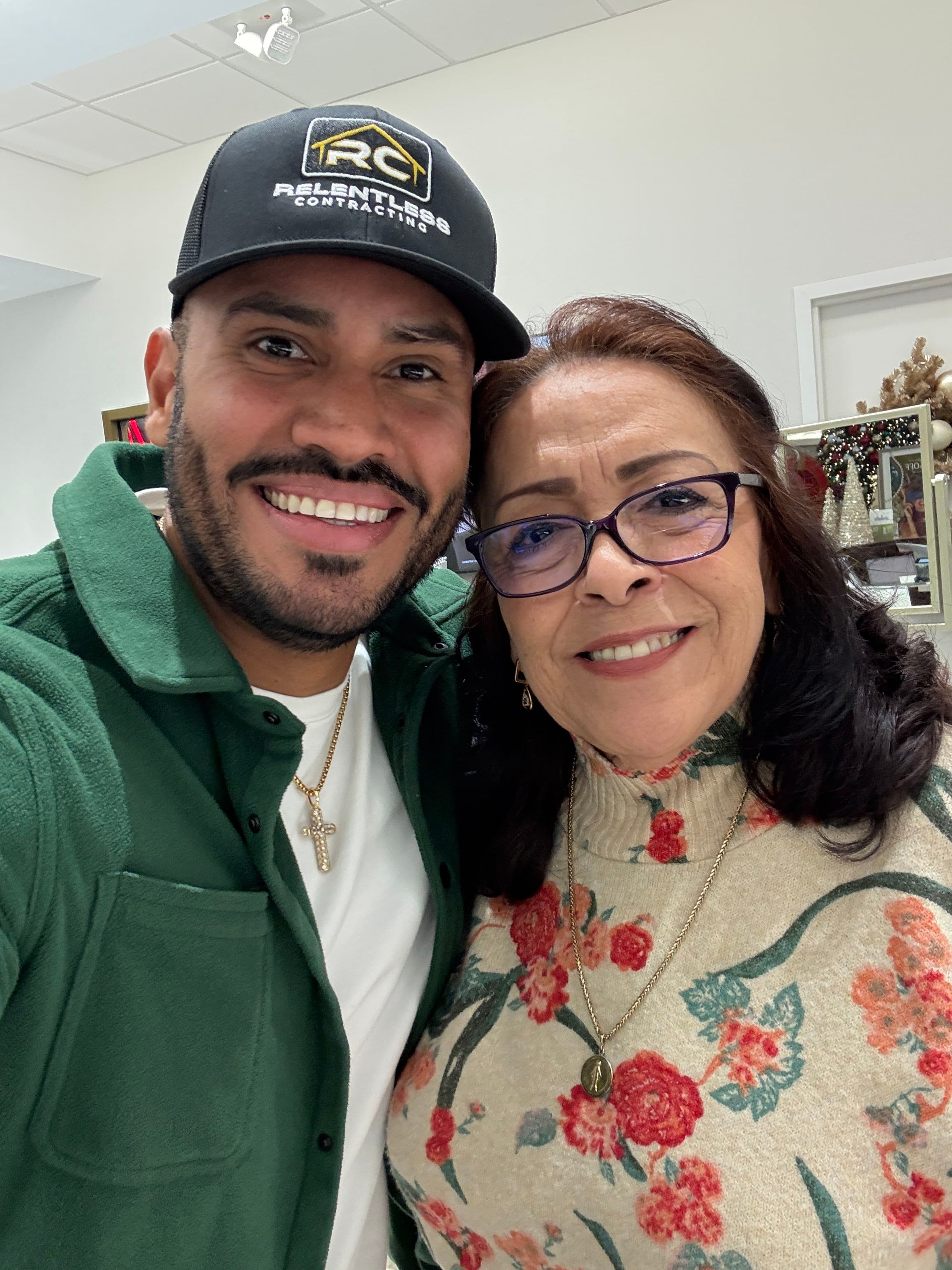 Happy Client Maria Celebrating a Dry Attic