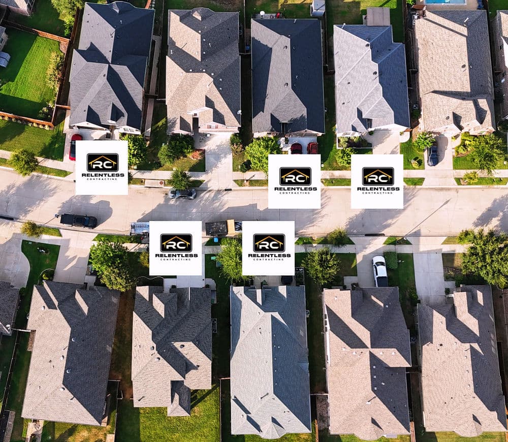 Aerial view of suburban homes with "Relentless" signage displayed on multiple properties.